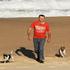 Jason with his dogs at the local beach.